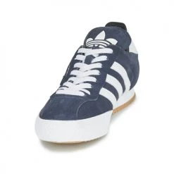 Chaussures Baskets basses adidas Originals SUPER SUEDE Marine / Bleu 7 Chaussures Baskets basses adidas Originals SUPER SUEDE Marine / Bleu -Baskets mode Soldes 19933695 500 C